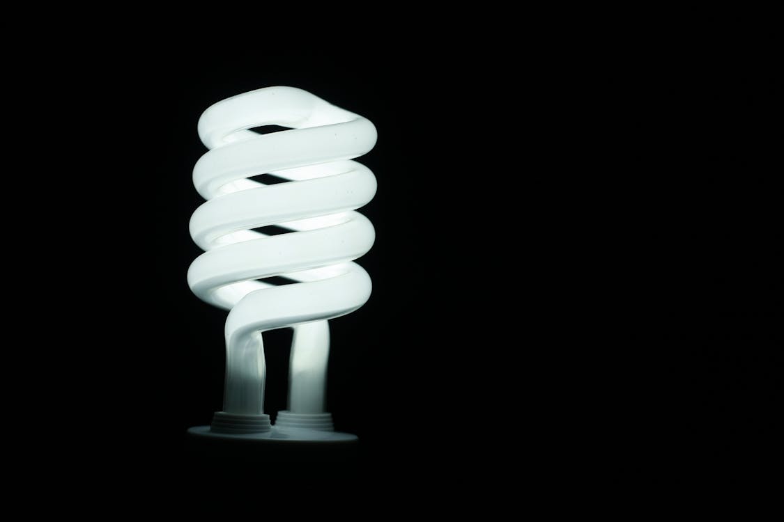 Free Illuminated Lamp Against Black Background Stock Photo