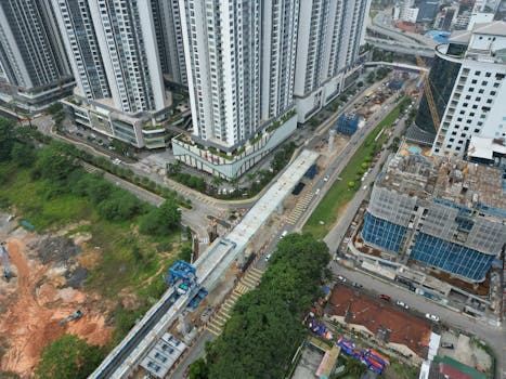 Aerial view of skyscrapers and construction in Johor Bahru, Malaysia.
