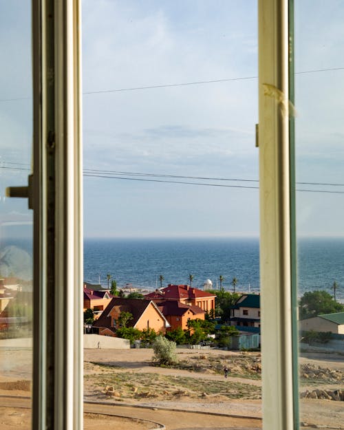 Kostnadsfri bild av fönster, fönstervy, havet