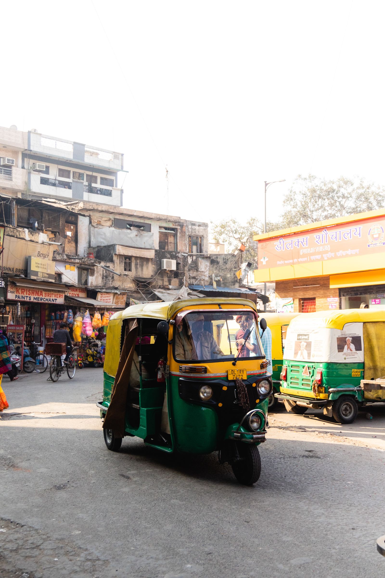 Blurred Auto Rickshaw on Street · Free Stock Photo