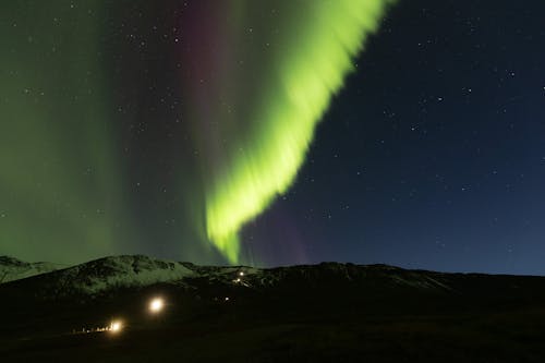 arazi, Aurora borealis, gece gökyüzü içeren Ücretsiz stok fotoğraf