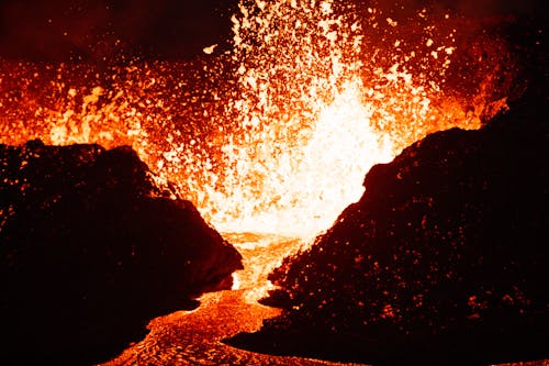 A lava flow is shown in the dark