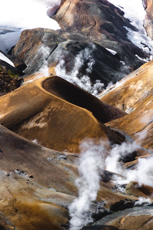 A mountain with steam coming out of it