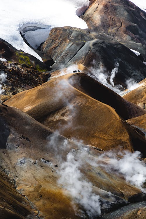 A mountain with steam coming out of it