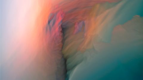 Colorful abstract representation of an ocean sunset with ethereal hues.