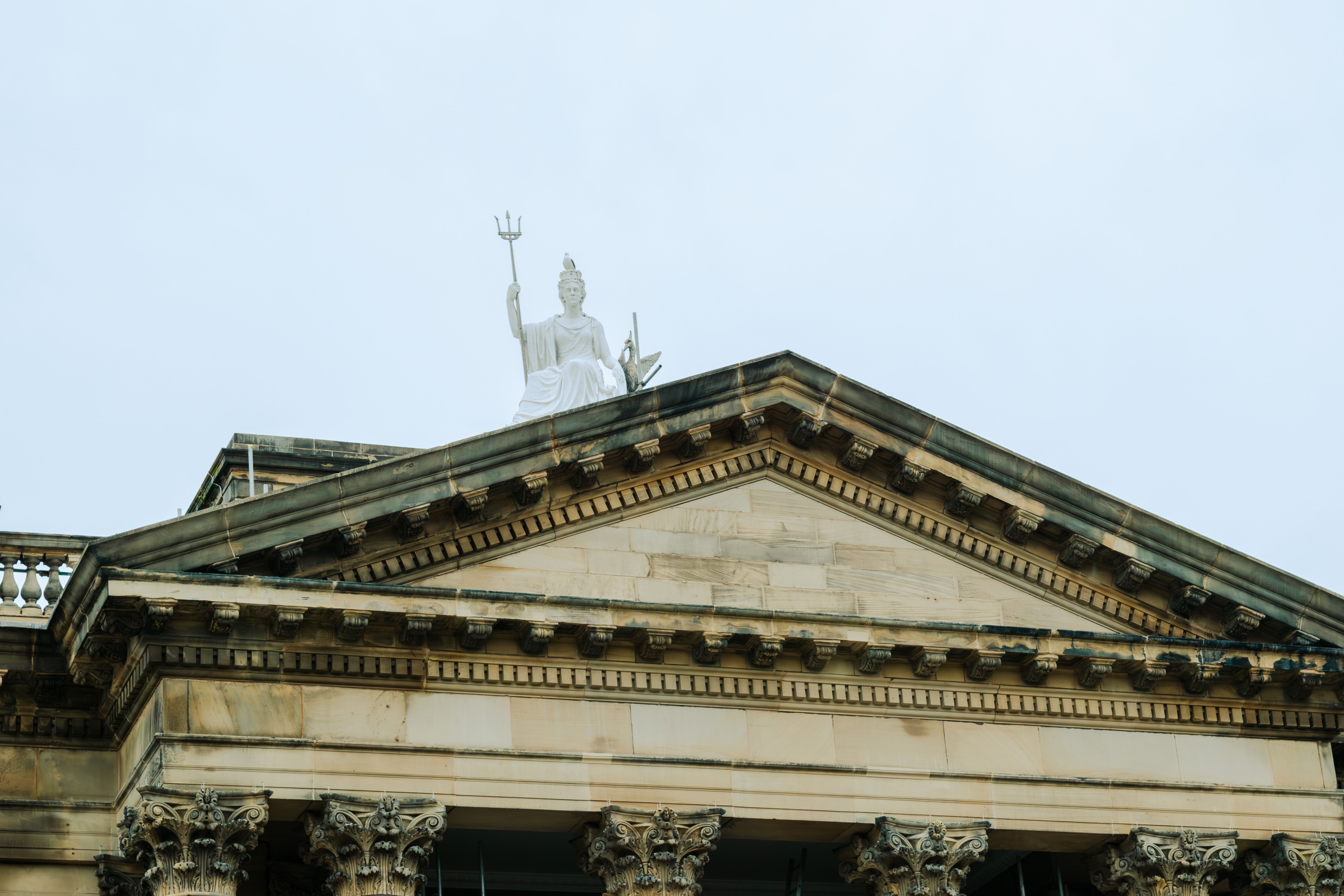 A classic view of the Walker Art Gallery's façade in Liverpool, England, showcasing neoclassical architecture.