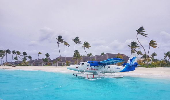 Seaplane transfer with atoll views — Maldives