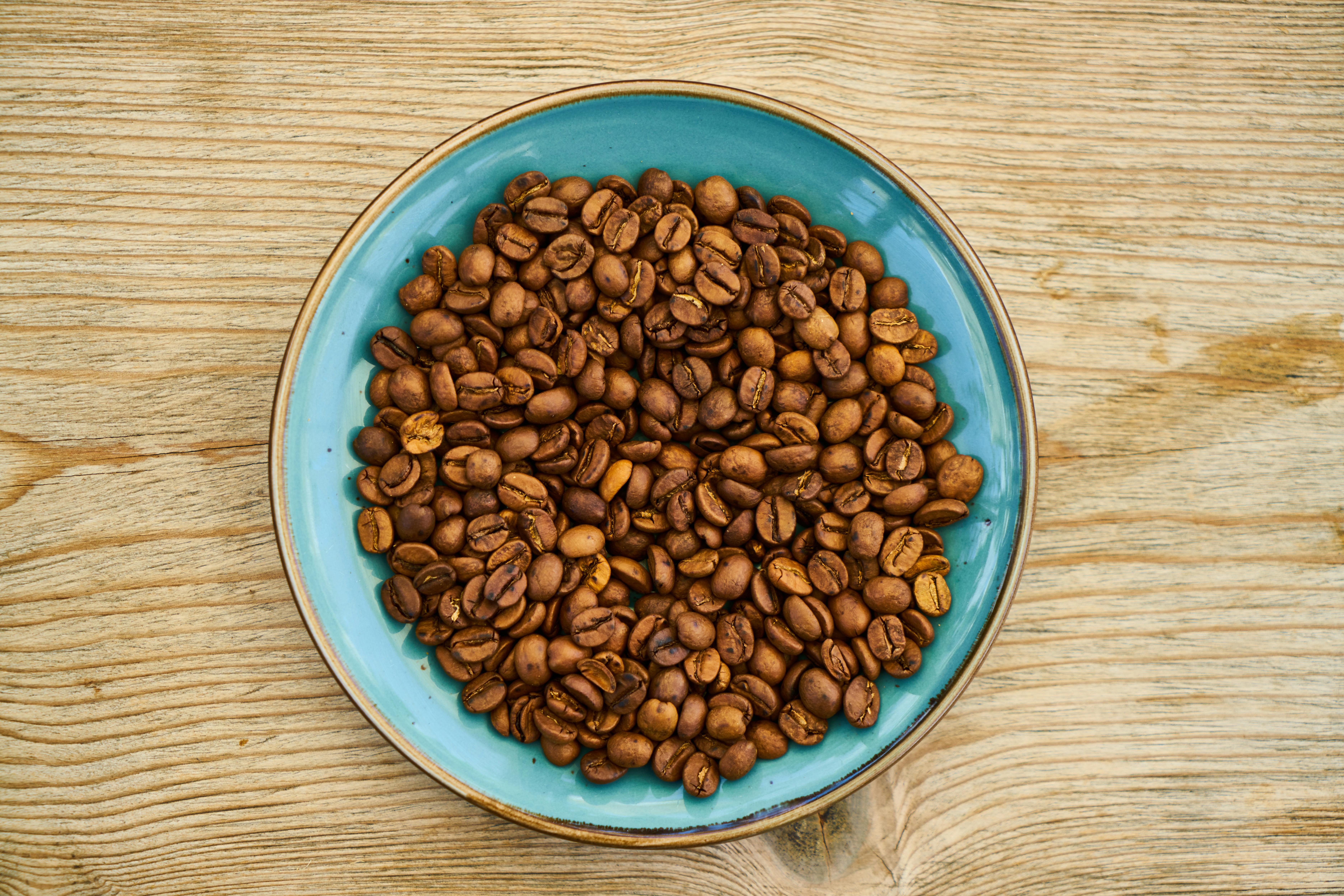 Flat Lay Photo of Coffee Beans on Bowl · Free Stock Photo