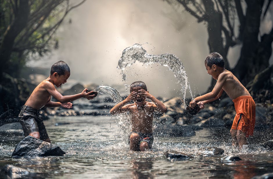 Group of People Splashing Water