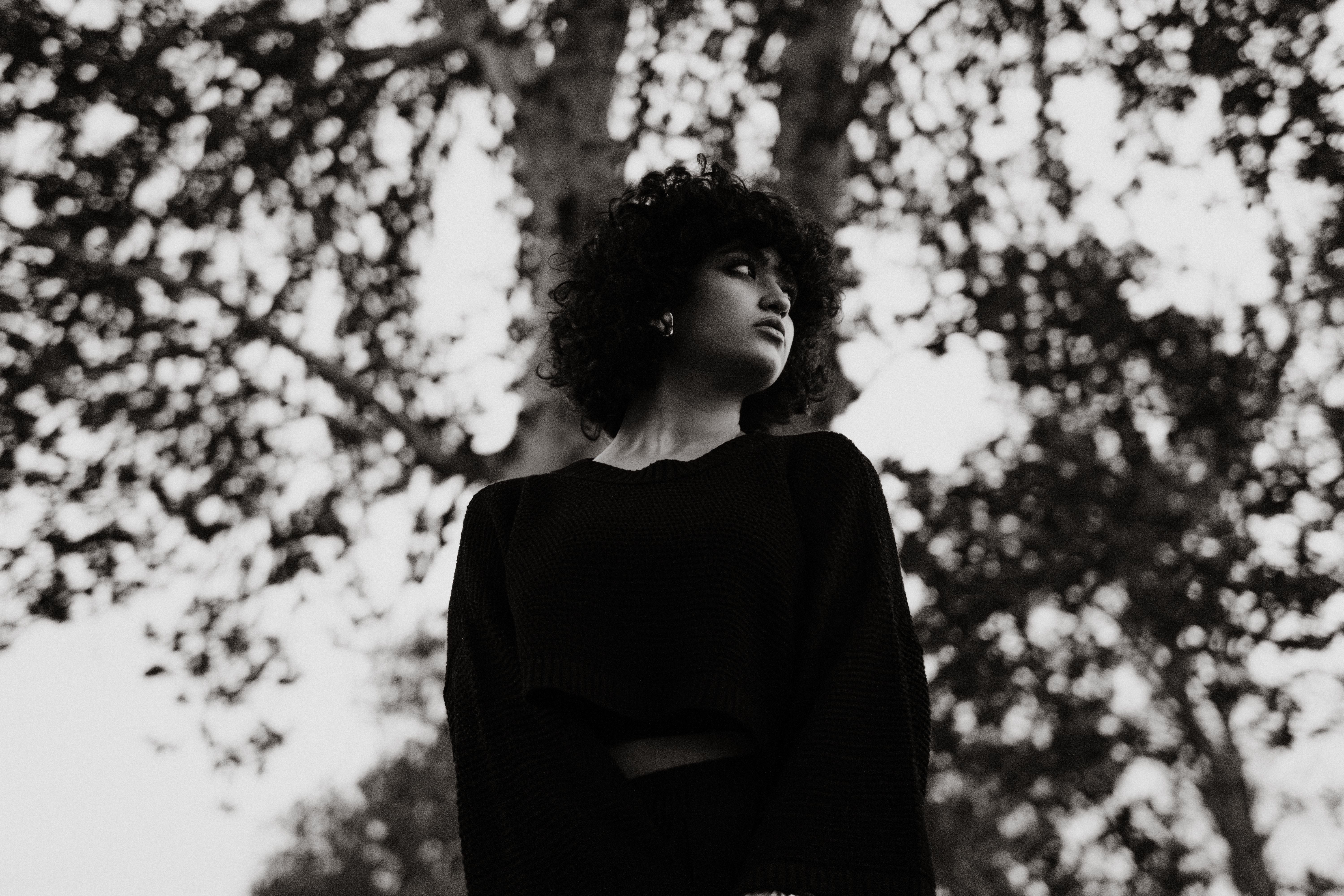 Black and White Photography of a Woman in Curly Hair · Free Stock Photo
