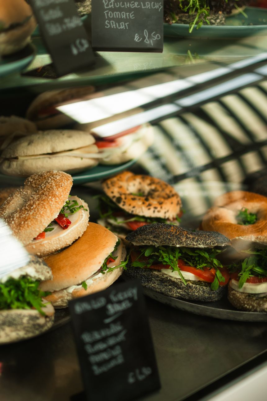 Sandwiches with fresh ingredients displayed in a cafe setting — photo by cami on Pexels