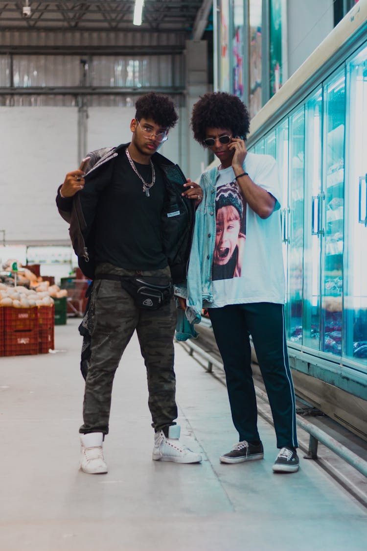 Photo Of Two Men Posing By Supermarket Frozen Aisle Section