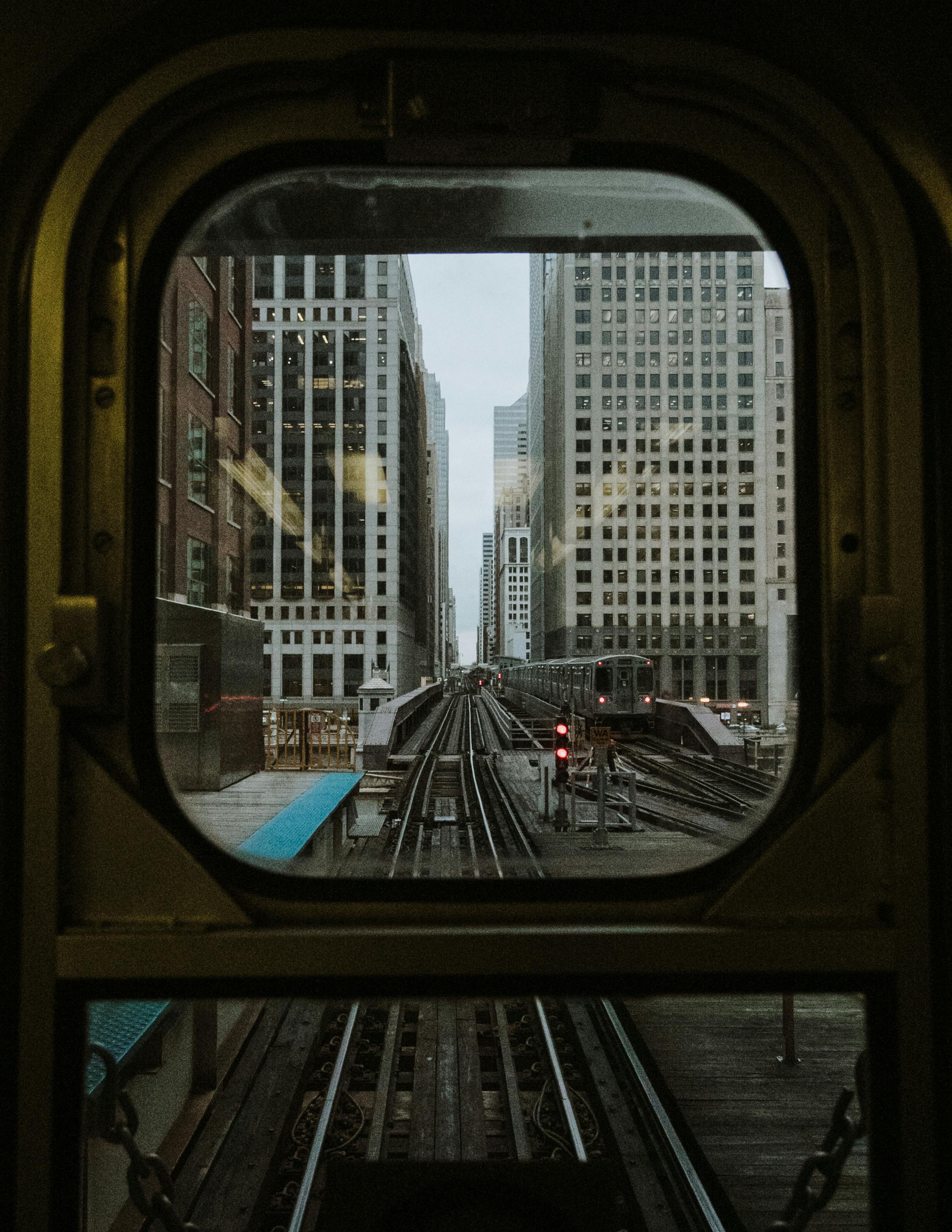 window train overlooking buildings