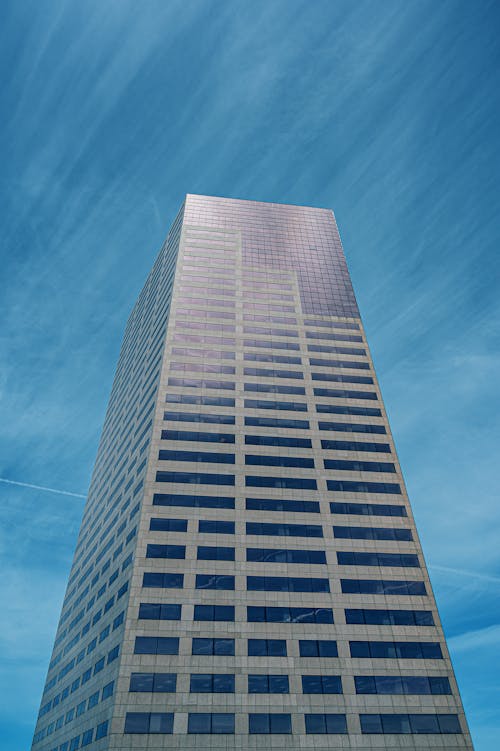 Low-angle Photo of High-rise Building Under Blue Sky