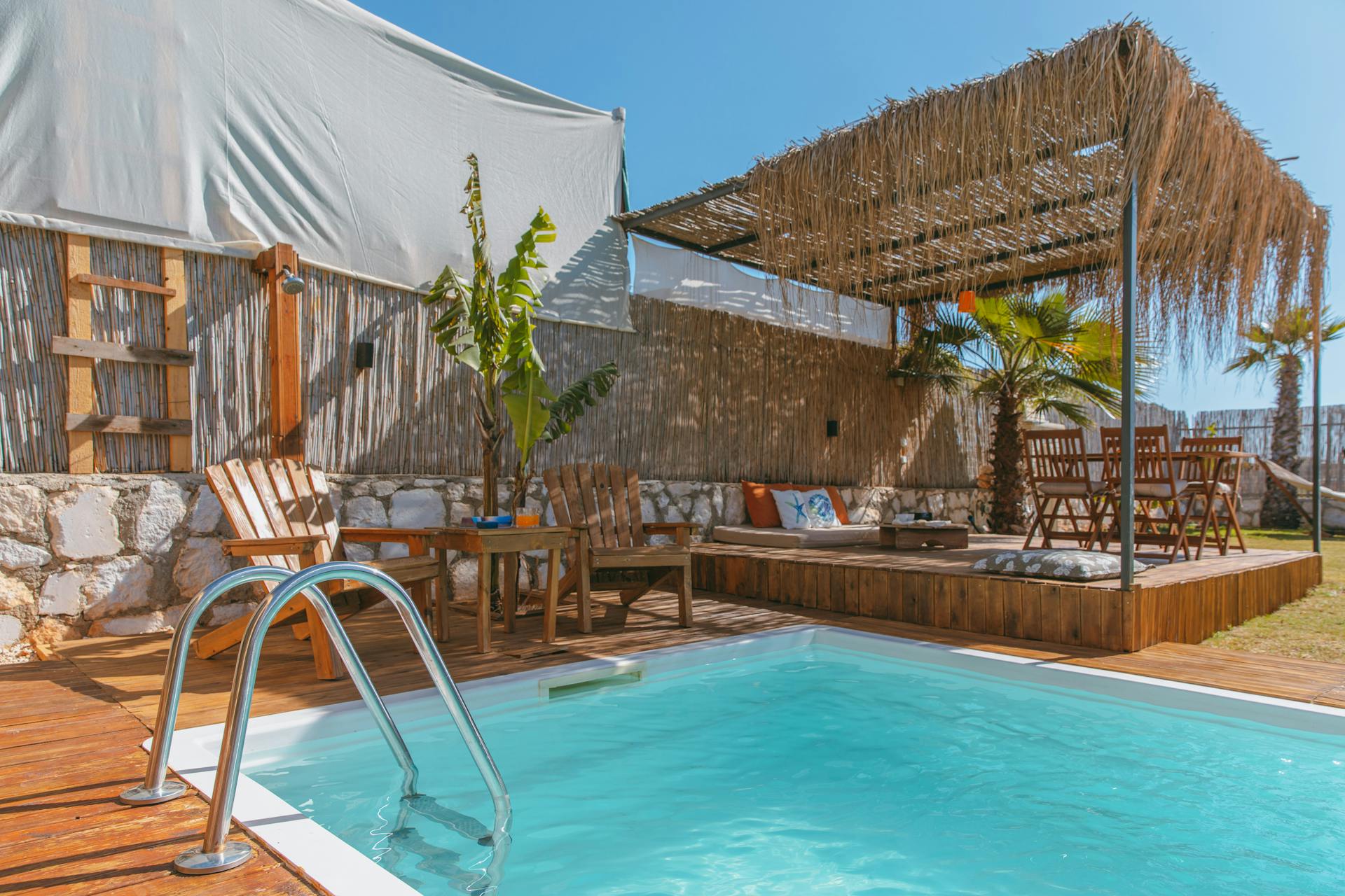 View of the Swimming Pool and the Deck at a Tropical Resort