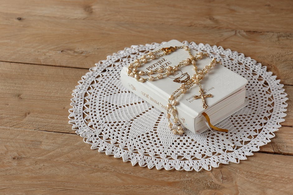 Close-up View of Bible And Rosary