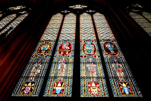 Free Low Angle View of Stained Glass Window Stock Photo