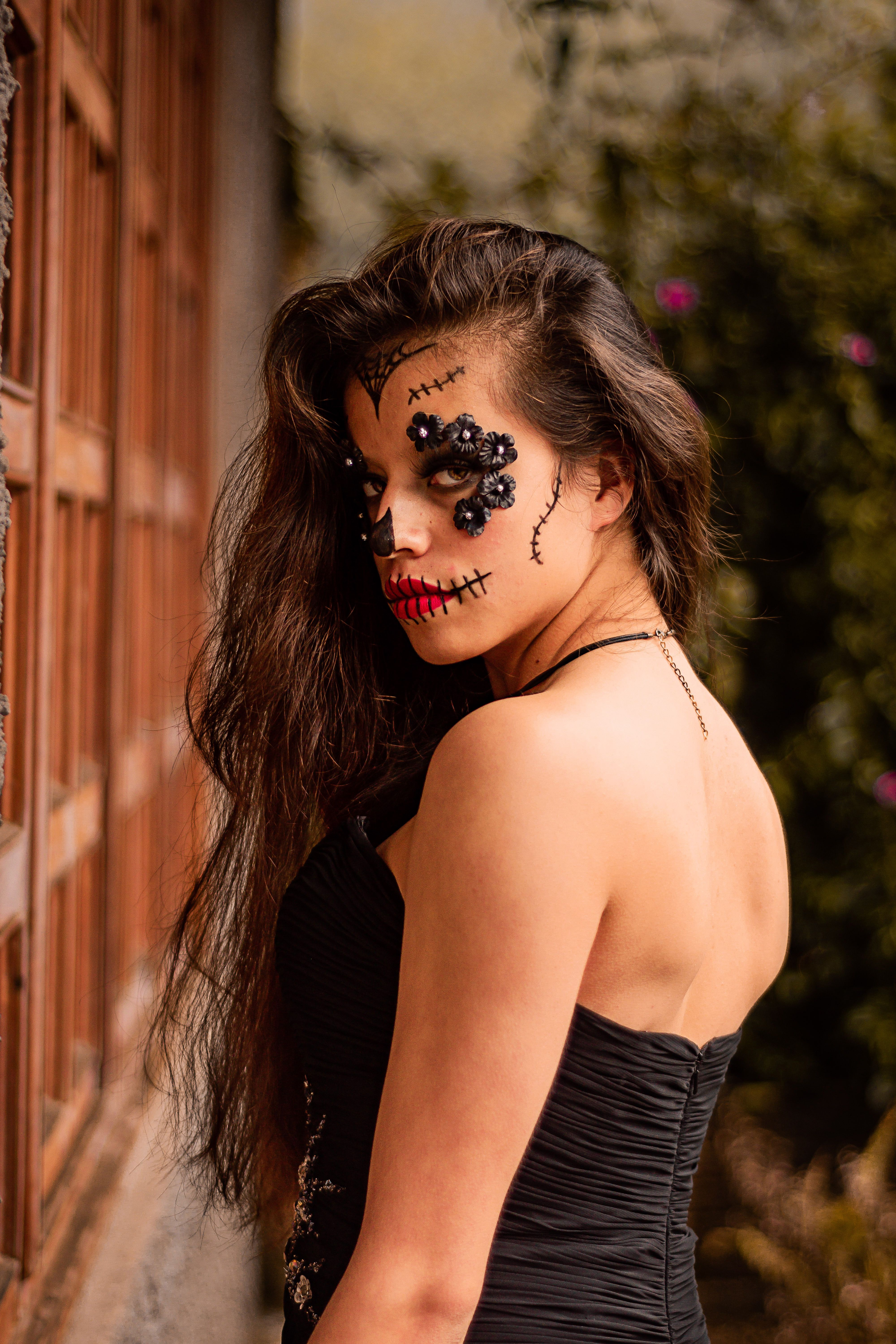 Brunette Woman Posing in Black Dress · Free Stock Photo