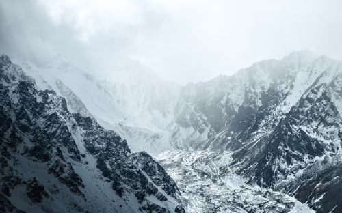 Free Majestic snowy peaks in Almaty, Kazakhstan offer a breathtaking winter landscape. Stock Photo