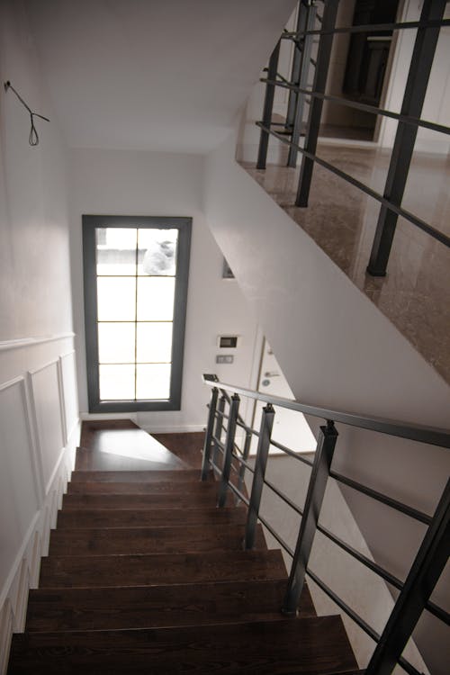 A stairway leading to a door in a house