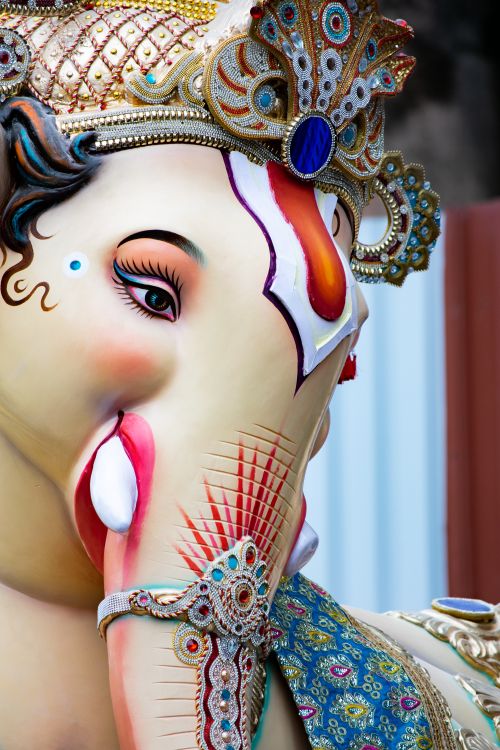 Free Close-up of a vibrant Lord Ganesha idol adorned with intricate decorations in Mumbai, India. Stock Photo