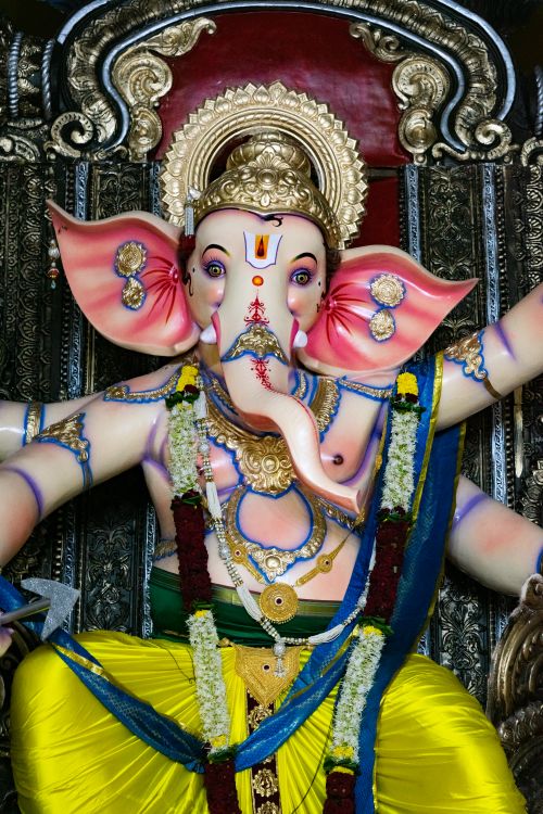 Free Vibrant Ganesh idol decorated for Ganesh Chaturthi festival in Mumbai, India. Stock Photo