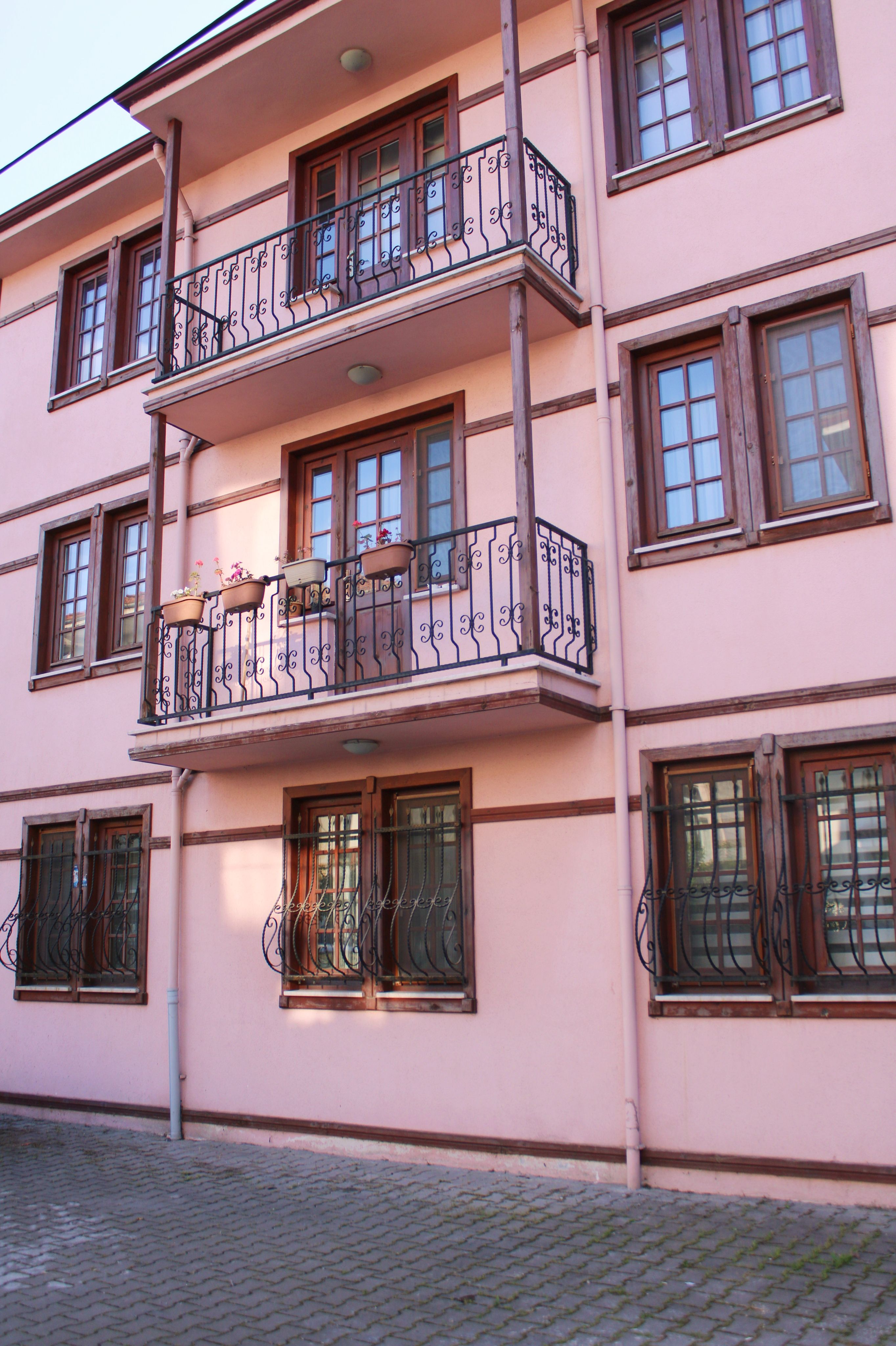Pink Building with Balconies · Free Stock Photo