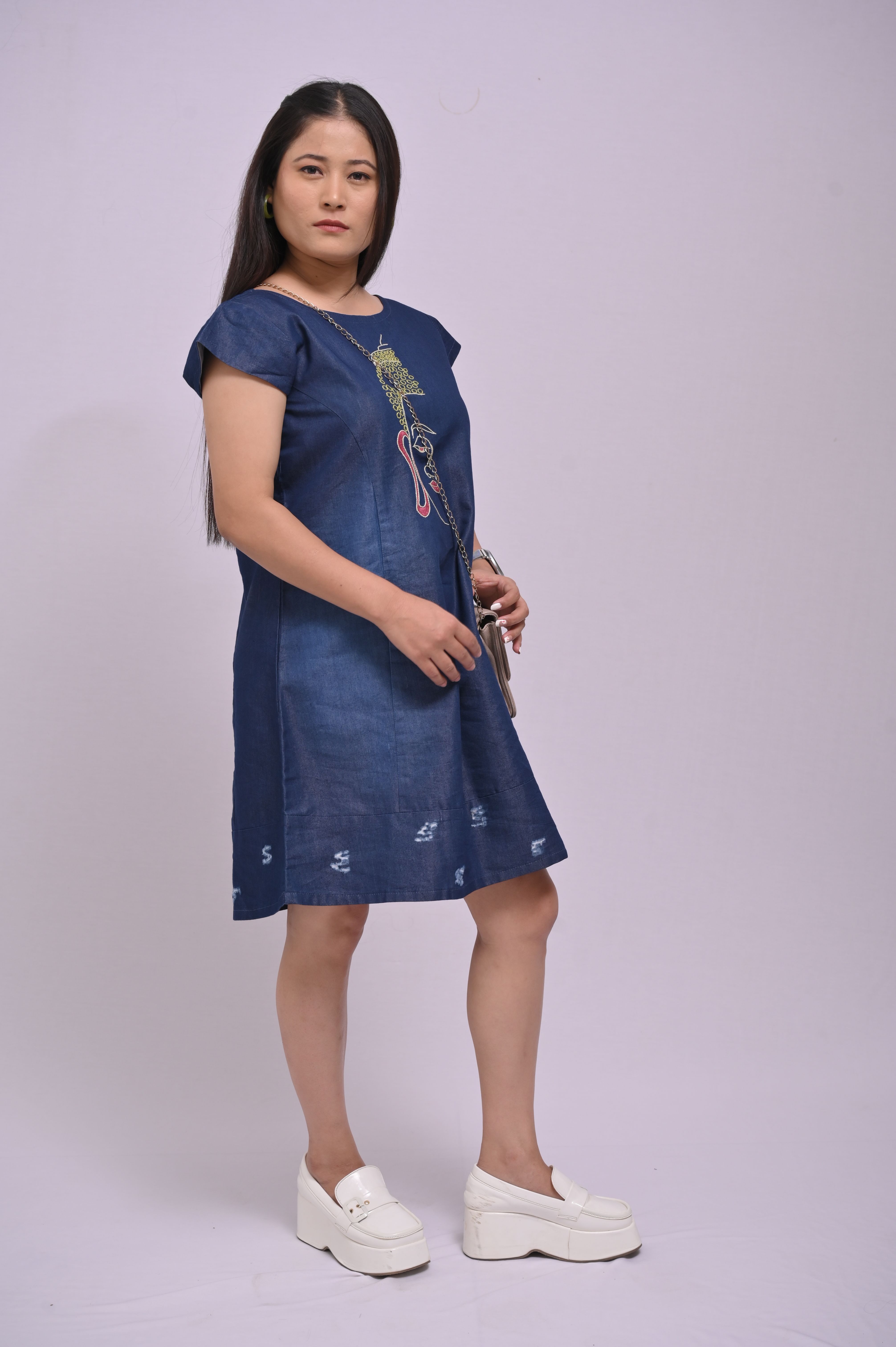 Studio Shot of a Young Woman Wearing a Dress Free Stock Photo Studio Shot of a Young Woman Wearing a Dress Free Stock Photo