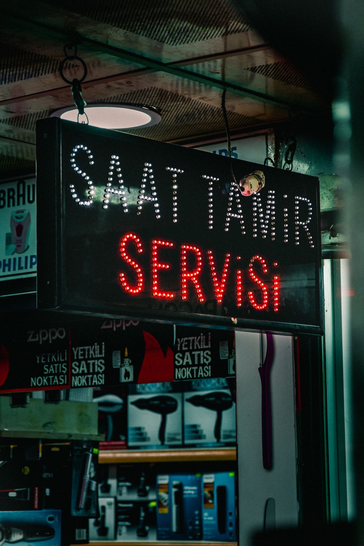 LED signage display on a storefront representing traditional complex setups