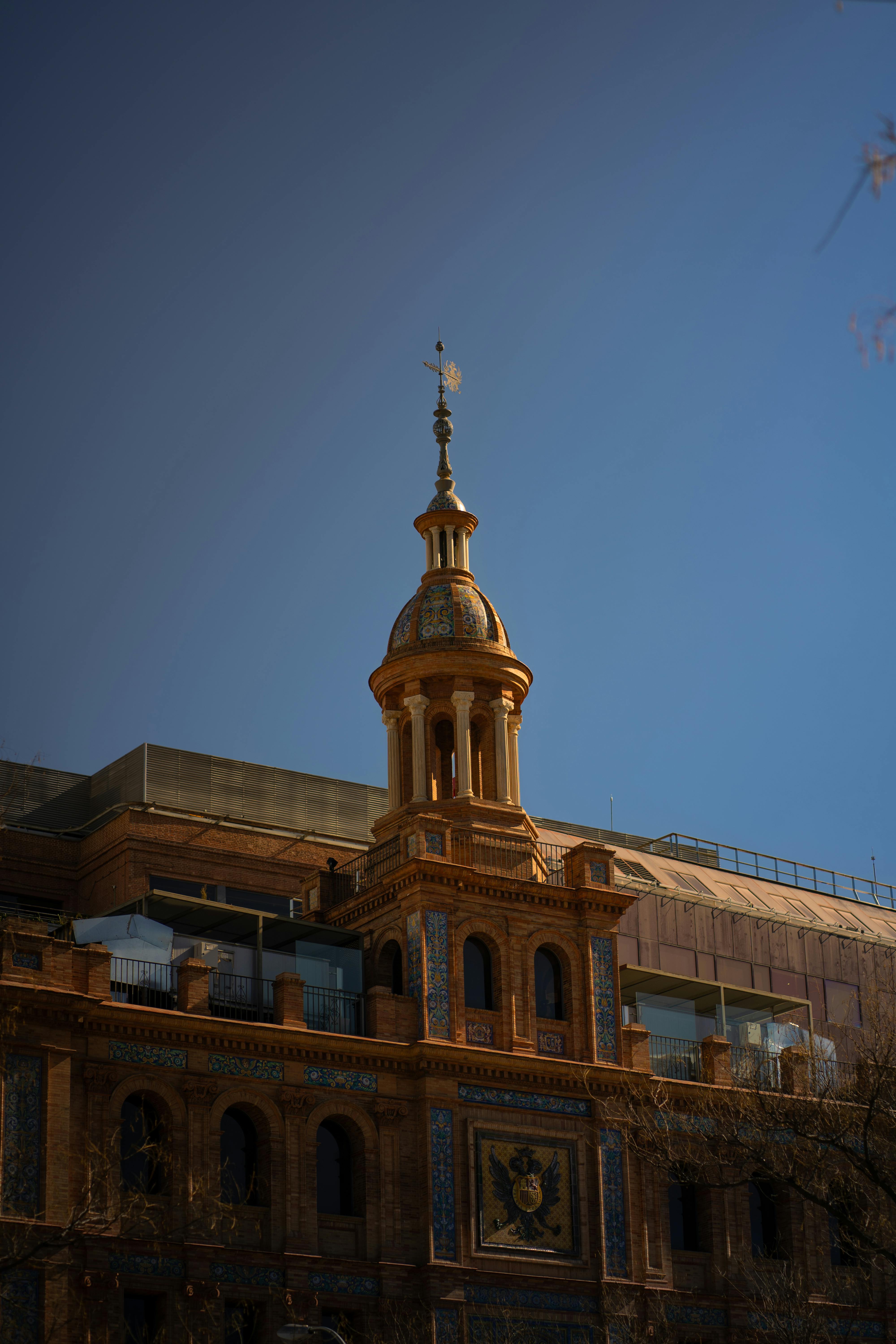 beautiful cathedral with a tower under a blue sky