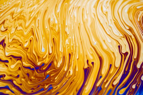 Free Dynamic swirling patterns in vibrant yellow and blue abstract art. Ideal for creative projects. Stock Photo