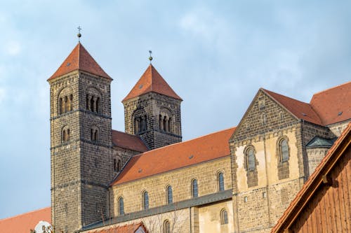 A large church with two towers and a clock