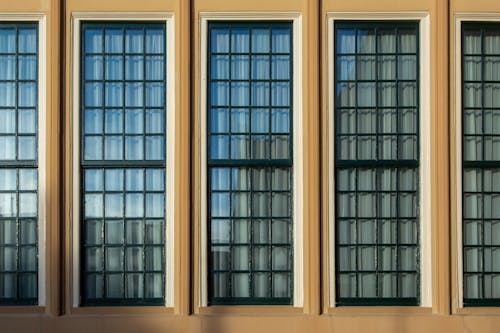 A row of windows with different colors and sizes