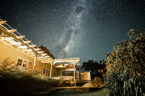 The milky way over the house at night