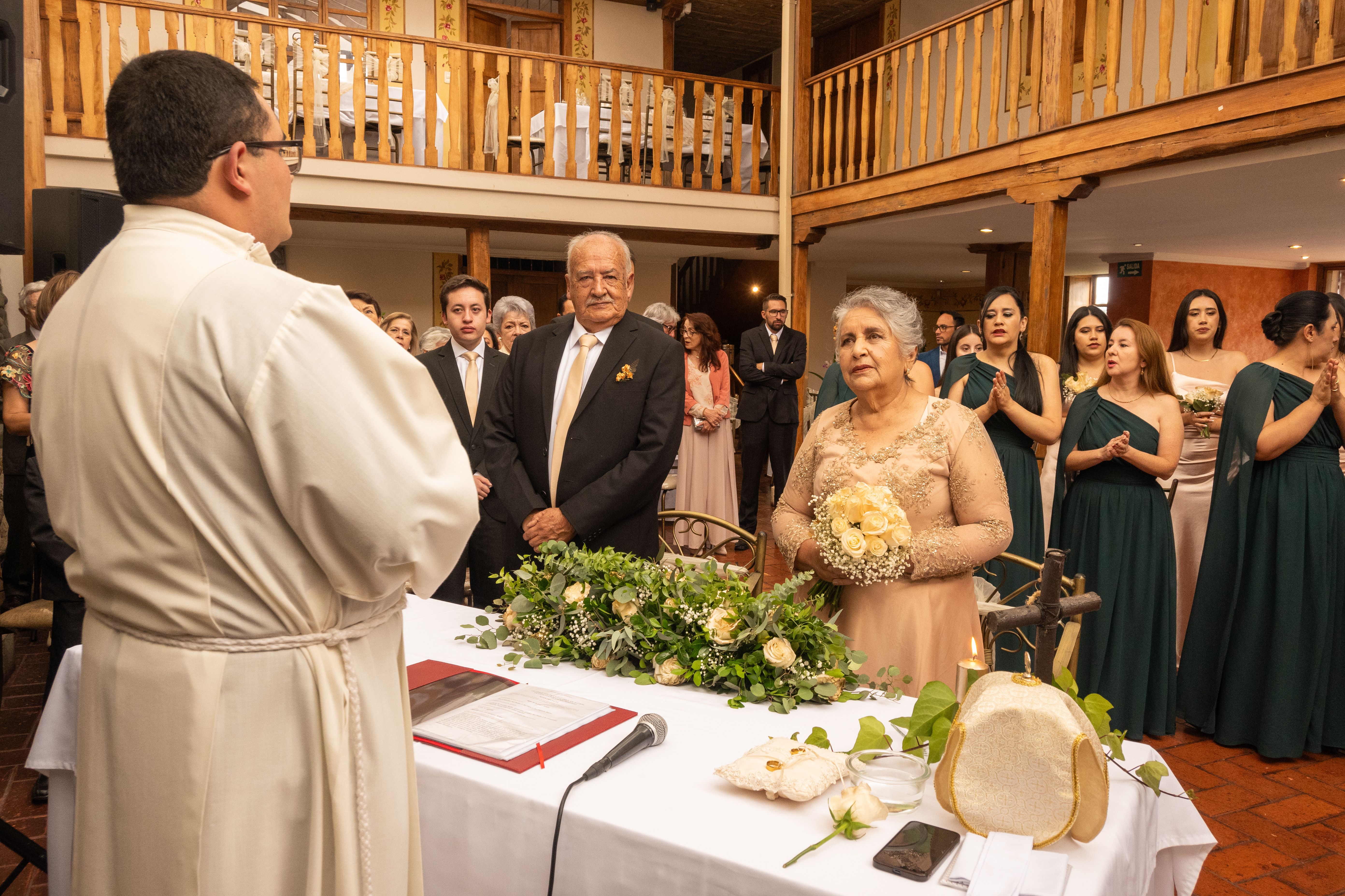 Beautiful wedding ceremony with bride, groom, and guests in Cuenca, Ecuador.