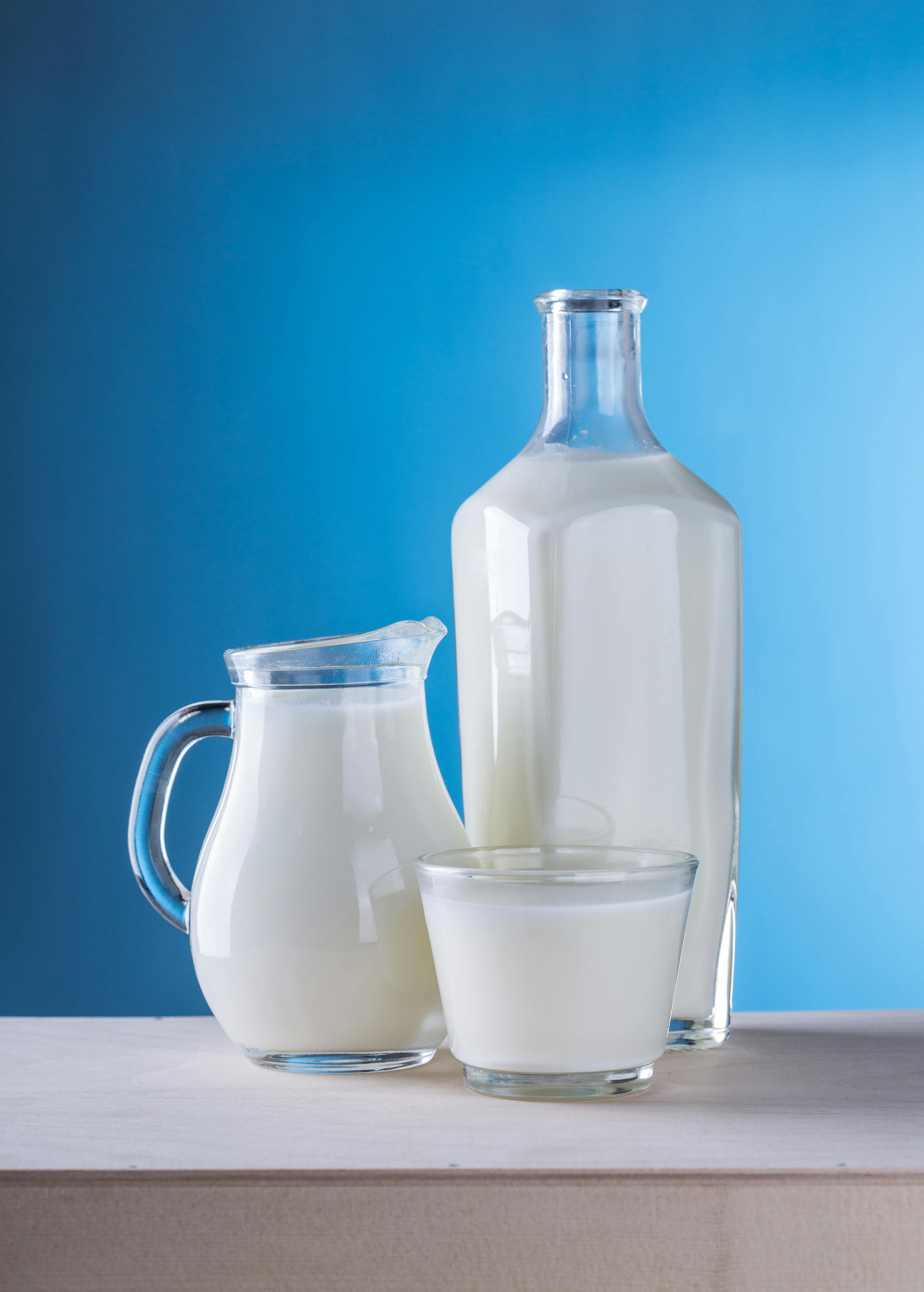 Close-up of Milk Against Blue Background · Free Stock Photo