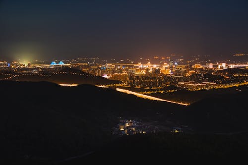 Gratis stockfoto met lamp vuur, lampenlicht, nacht uitzicht op de stad