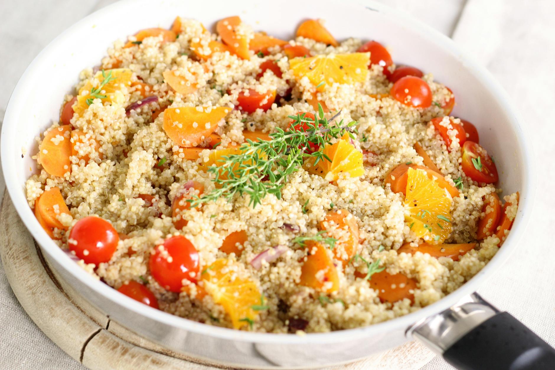 Quinoa In A Bowl With Fresh Vegetables And Herbs