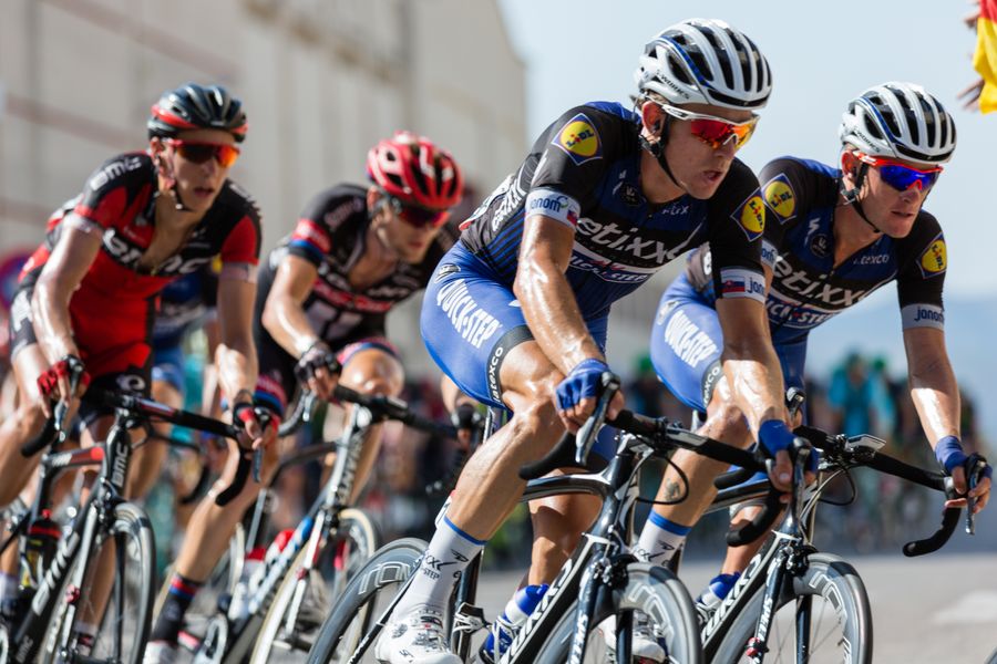 Road cyclist wearing performance cycling gear
