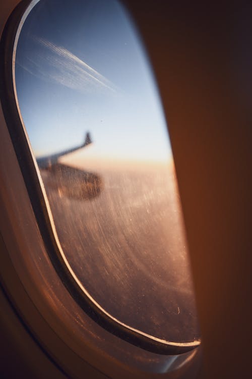 Foto stok gratis jendela pesawat, latar belakang 4k, penerbangan