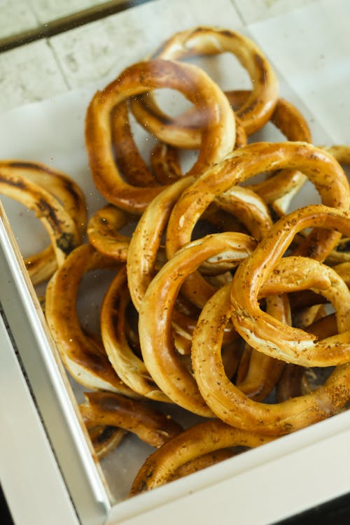 A tray of pretzels sitting on top of a counter