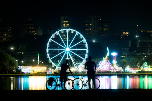 城市, 摩天輪, 晚上 的 免费素材图片