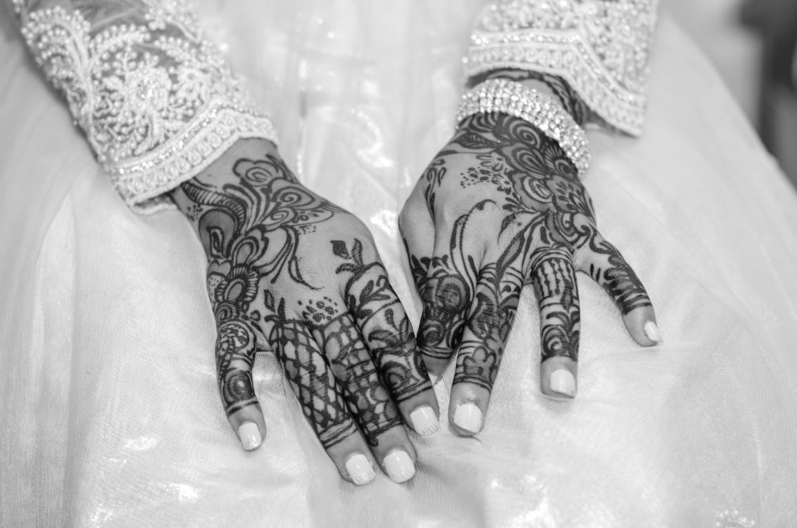 Free Photo of Bride's  Arm's  with  Mehndi  Tattoo  Stock Photo
