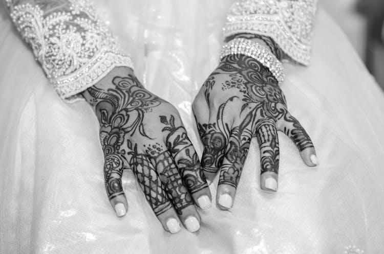 Photo Of Bride's  Arm's  With  Mehndi  Tattoo 