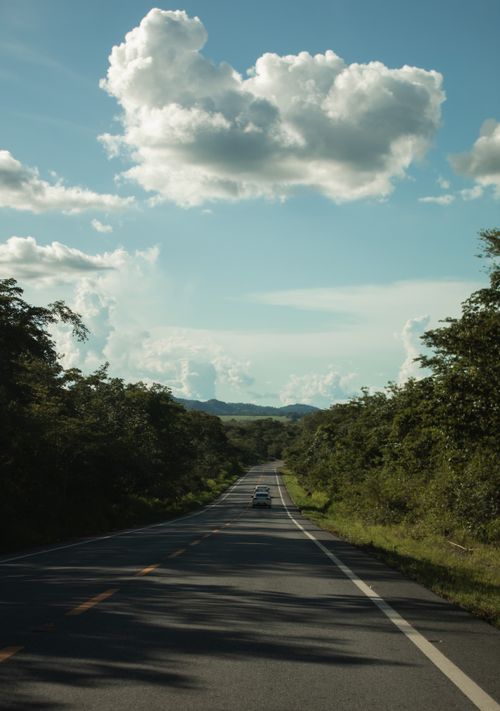 Free Explore a picturesque country road under a blue sky in Bonito, Brazil. Stock Photo