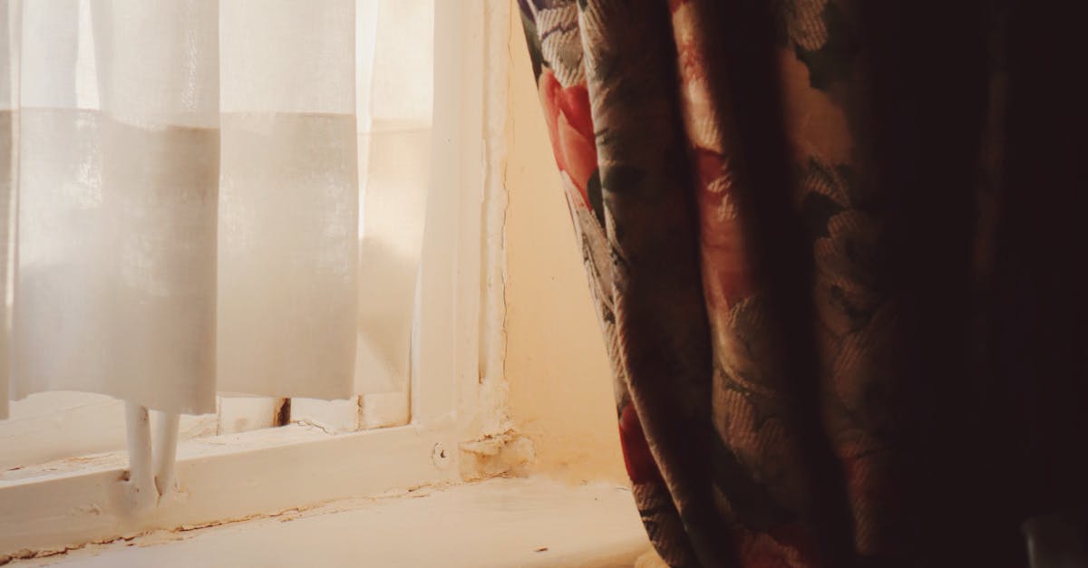 Floral Curtain Tied with a Rope by an Old Wooden Window · Free Stock Photo