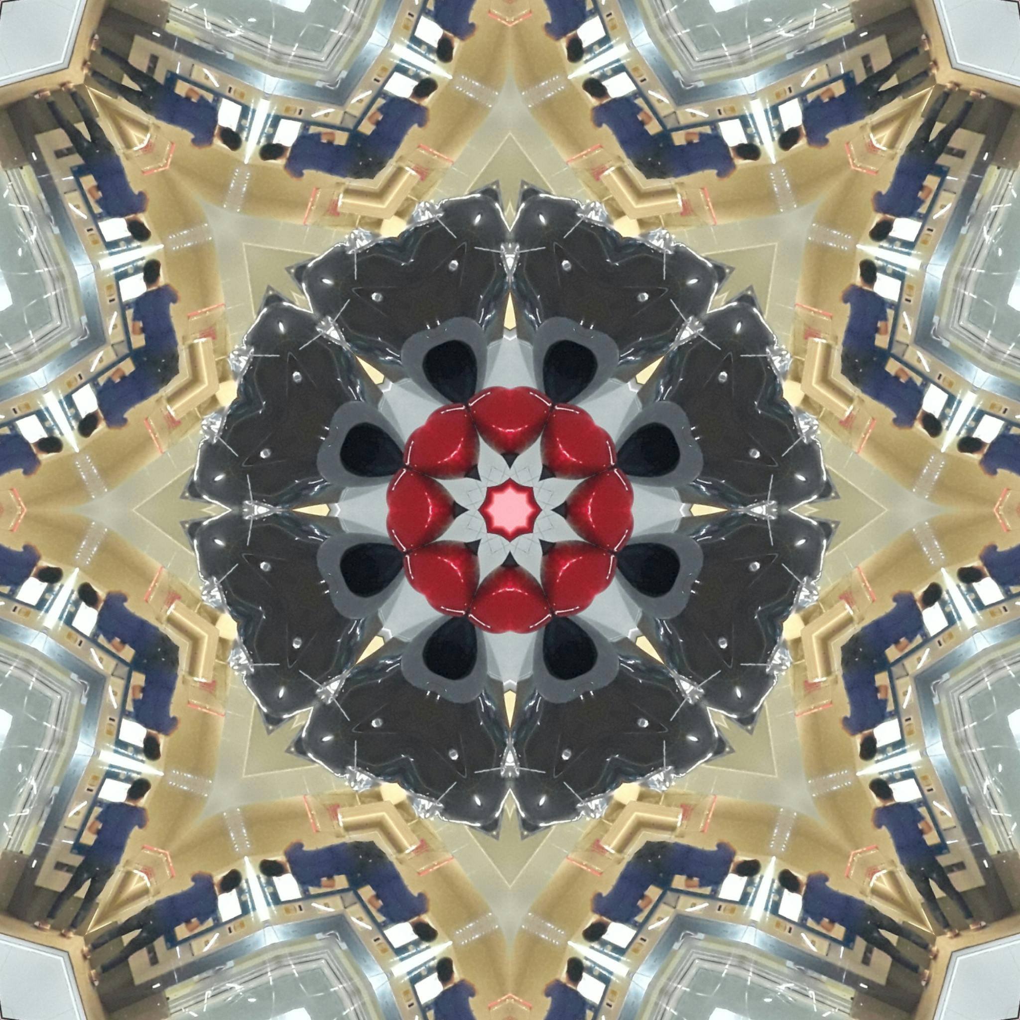 万花筒的五颜六色设计展示了一个充满活力、兼具几何对称的抽象图案