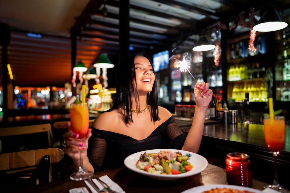solo traveler enjoying a meal at a restaurant bar - solo trip ideas solo traveler enjoying a meal at a restaurant bar - solo trip ideas