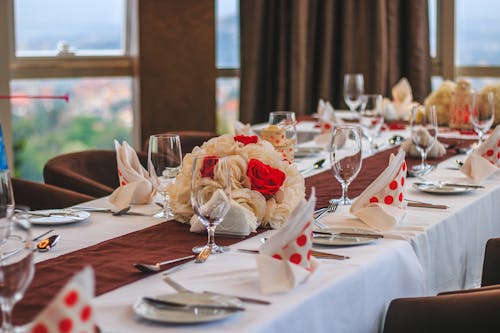 Free Table With Dishes Near Windows Stock Photo