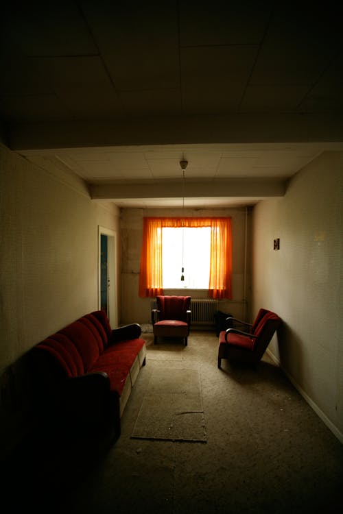 бесплатная Красный диван и кресло Стоковое фото